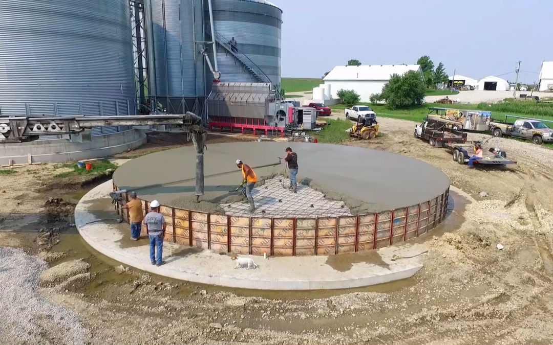 pouring concrete for grain bin