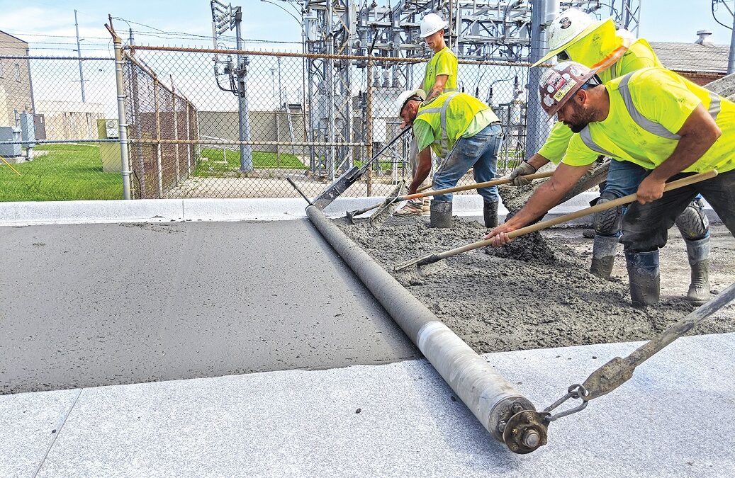 Batt Screed concrete roller screed used on municipal Street Repair