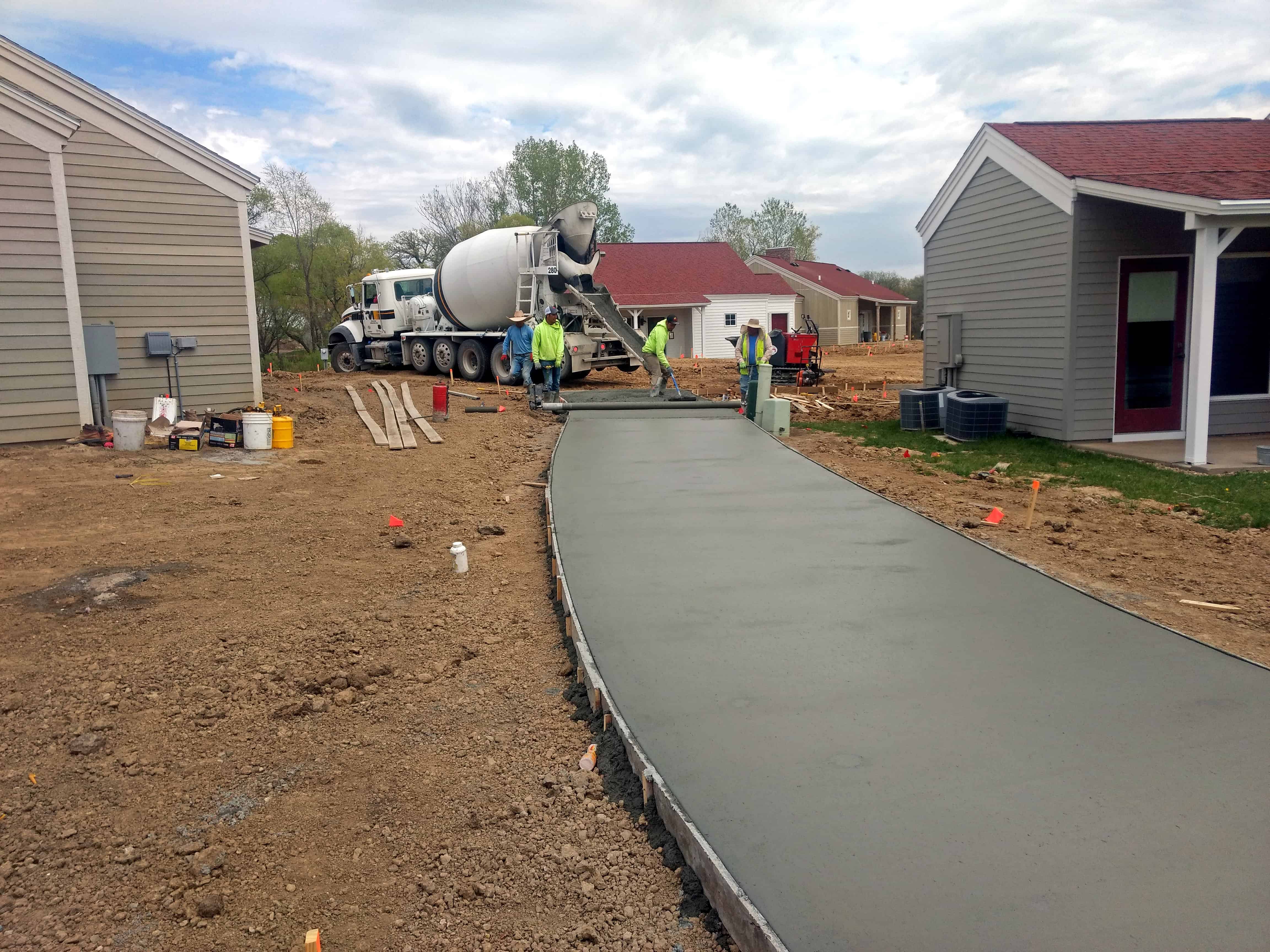 Batt Screed shaping community driveway